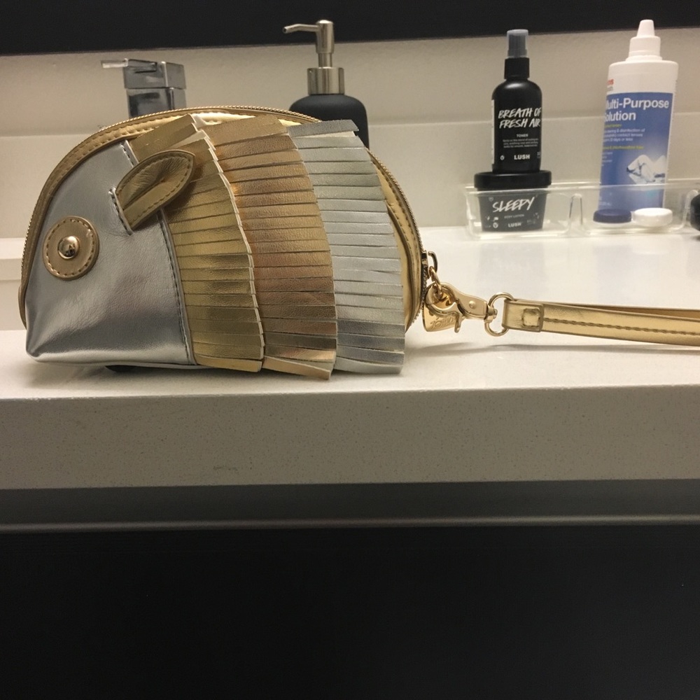 Hamster shaped clutch that rolls